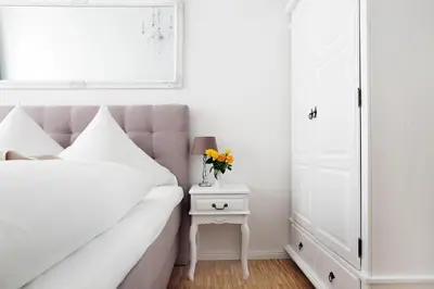 Ein Bett oder Betten in einem Zimmer der Unterkunft SC 02 by ROCKCHAIR Apartments l SUPERHOST Status l 4 Bedrooms Boxspringbeds 2 Bathrooms Balcony Elevator - Cozy Family & Business Flair welcomes you!
