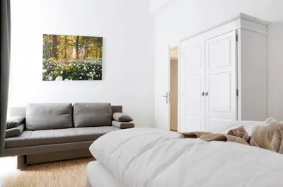 Ein Sitzbereich in der Unterkunft SC 04 by ROCKCHAIR Apartments l SUPERHOST Status l 4 Bedrooms Boxspringbeds 2 Bathrooms Balcony Elevator - Cozy Family & Business Flair welcomes you!