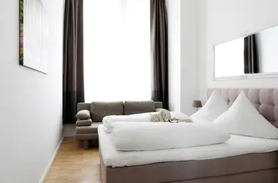 Ein Sitzbereich in der Unterkunft SC 04 by ROCKCHAIR Apartments l SUPERHOST Status l 4 Bedrooms Boxspringbeds 2 Bathrooms Balcony Elevator - Cozy Family & Business Flair welcomes you!