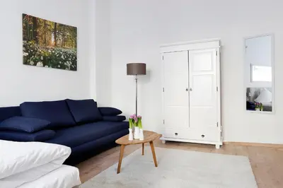 Ein Sitzbereich in der Unterkunft BLISSE by ROCKCHAIR Apartments l SUPERHOST Status l 5 Schlafzimmer 3 Bäder 3 Balkone l Family & Business Flair welcomes you!