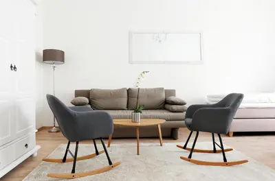 Ein Sitzbereich in der Unterkunft BLISSE by ROCKCHAIR Apartments l SUPERHOST Status l 5 Schlafzimmer 3 Bäder 3 Balkone l Family & Business Flair welcomes you!