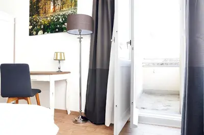 Ein Bett oder Betten in einem Zimmer der Unterkunft BLISSE by ROCKCHAIR Apartments l SUPERHOST Status l 5 Schlafzimmer 3 Bäder 3 Balkone l Family & Business Flair welcomes you!