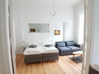 Ein Sitzbereich in der Unterkunft LANG Re by ROCKCHAIR Apartments l SUPERHOST Status l 2 Bedrooms Boxspringbeds in City Center - Cozy Family & Business Flair welcomes you!