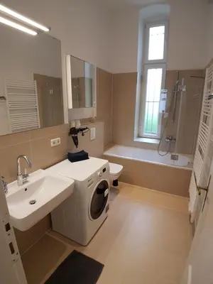 Ein Badezimmer in der Unterkunft LANG Re by ROCKCHAIR Apartments l SUPERHOST Status l 2 Bedrooms Boxspringbeds in City Center - Cozy Family & Business Flair welcomes you!