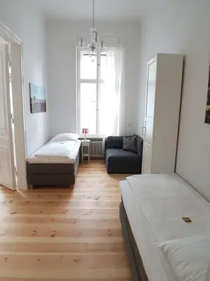 Ein Bett oder Betten in einem Zimmer der Unterkunft LANG Re by ROCKCHAIR Apartments l SUPERHOST Status l 2 Bedrooms Boxspringbeds in City Center - Cozy Family & Business Flair welcomes you!