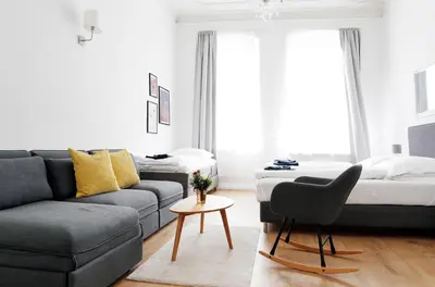 Ein Sitzbereich in der Unterkunft GREIF by ROCKCHAIR Apartments l SUPERHOST Status l 2 Bedrooms Boxspringbeds in City Center - Cozy Family & Business Flair welcomes you!