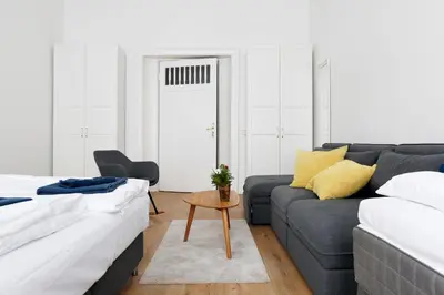 Ein Bett oder Betten in einem Zimmer der Unterkunft GREIF by ROCKCHAIR Apartments l SUPERHOST Status l 2 Bedrooms Boxspringbeds in City Center - Cozy Family & Business Flair welcomes you!
