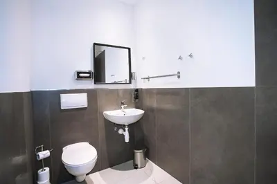 Ein Badezimmer in der Unterkunft Pension Peters – Das andere Hotel