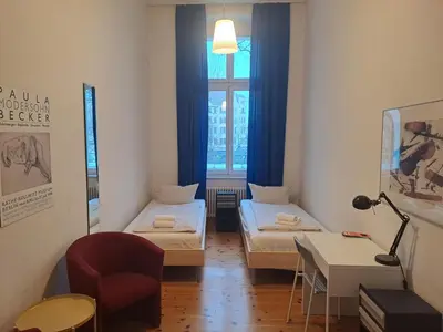 Ein Bett oder Betten in einem Zimmer der Unterkunft Pension Peters – Das andere Hotel