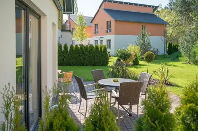 Ein Garten an der Unterkunft Ferienpark Rübezahl am Müggelsee
