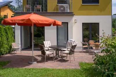 Ein Garten an der Unterkunft Ferienpark Rübezahl am Müggelsee