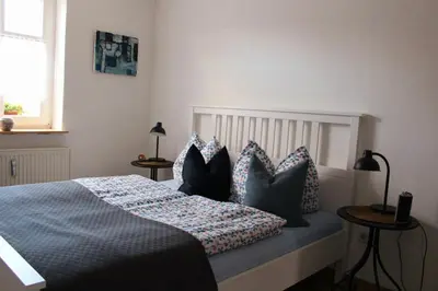 Ein Bett oder Betten in einem Zimmer der Unterkunft EG Die alte Stadtmühle von Kloster Zinna