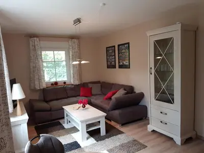 Ein Sitzbereich in der Unterkunft Ferienwohnung Mittelmühle
