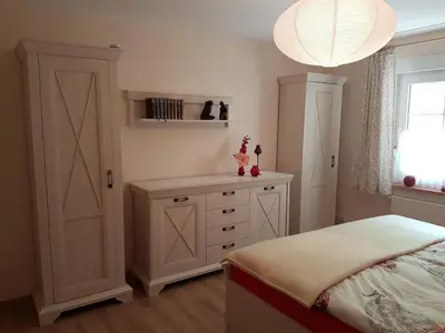 Ein Bett oder Betten in einem Zimmer der Unterkunft Ferienwohnung Mittelmühle
