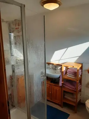 Ein Bett oder Betten in einem Zimmer der Unterkunft Ferienhaus Kerstin