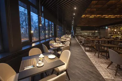 Ein Restaurant oder anderes Speiselokal in der Unterkunft Quentin XL Potsdamer Platz