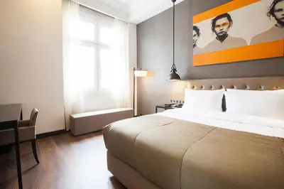 Ein Bett oder Betten in einem Zimmer der Unterkunft Quentin XL Potsdamer Platz