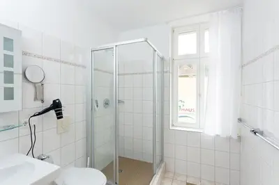 Ein Badezimmer in der Unterkunft Apartmenthaus am Grienericksee