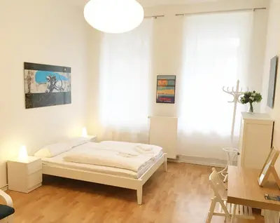 Ein Bett oder Betten in einem Zimmer der Unterkunft Downtown Apartment Berlin Friedrichshain
