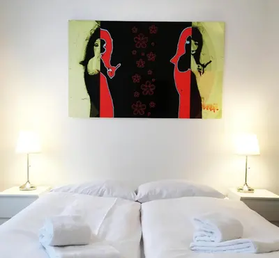 Ein Bett oder Betten in einem Zimmer der Unterkunft Downtown Apartment Berlin Friedrichshain