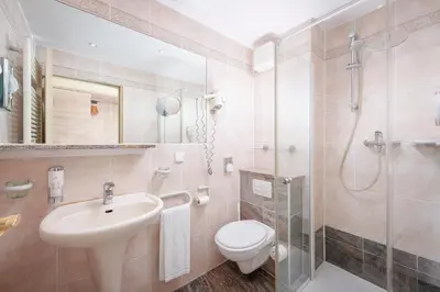 Ein Badezimmer in der Unterkunft Seehotel Grunewald