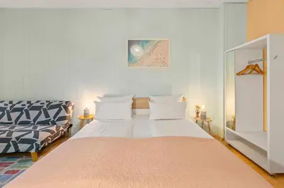 Ein Bett oder Betten in einem Zimmer der Unterkunft Holiday 33 Apartment H S-Bahn Schönhauser Allee