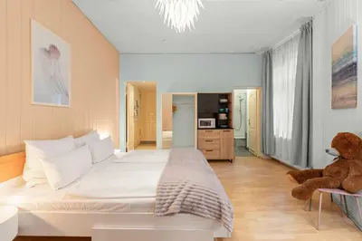 Ein Bett oder Betten in einem Zimmer der Unterkunft Holiday 33 Apartment H S-Bahn Schönhauser Allee