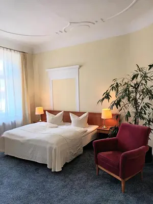 Ein Bett oder Betten in einem Zimmer der Unterkunft Hotel Vierseithof Luckenwalde