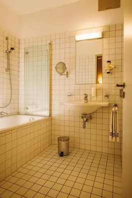 Ein Badezimmer in der Unterkunft Hotel Vierseithof Luckenwalde