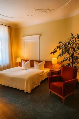 Ein Bett oder Betten in einem Zimmer der Unterkunft Hotel Vierseithof Luckenwalde