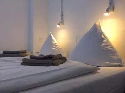 Ein Bett oder Betten in einem Zimmer der Unterkunft BNB near Brandenburg Gate - Rooms & Apartments