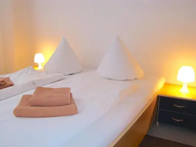 Ein Bett oder Betten in einem Zimmer der Unterkunft BNB near Brandenburg Gate - Rooms & Apartments
