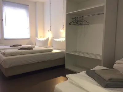 Ein Bett oder Betten in einem Zimmer der Unterkunft BNB near Brandenburg Gate - Rooms & Apartments