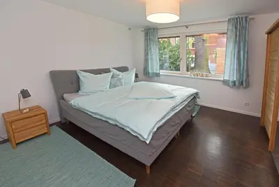 Ein Bett oder Betten in einem Zimmer der Unterkunft Unter den Eichen