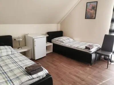 Ein Bett oder Betten in einem Zimmer der Unterkunft Gästehaus Sol Tour