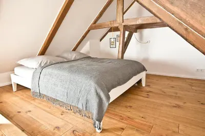 Ein Bett oder Betten in einem Zimmer der Unterkunft Scheune de Lütt - Kleine Scheune ganz groß am Rande der Schorfheide - Natur pur