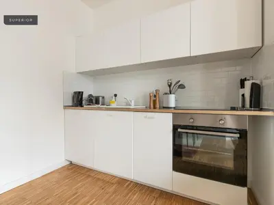 Küche/Küchenzeile in der Unterkunft Apartments Berlin Aroser Allee