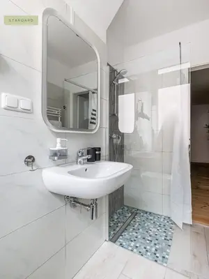 Ein Badezimmer in der Unterkunft Apartments Berlin Aroser Allee