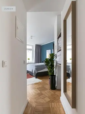 Ein Bett oder Betten in einem Zimmer der Unterkunft Apartments Berlin Aroser Allee