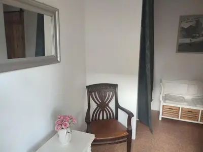 Ein Bett oder Betten in einem Zimmer der Unterkunft Ferienwohnung Birkenwerder bei Berlin mit Terrasse und kleinem Garten