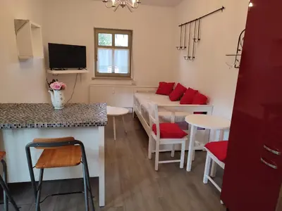 TV/Unterhaltungsangebot in der Unterkunft Ferienwohnung Birkenwerder bei Berlin mit Terrasse und kleinem Garten