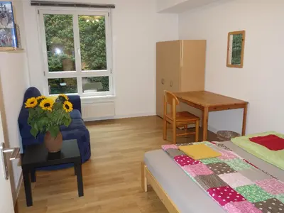 Ein Bett oder Betten in einem Zimmer der Unterkunft Private Rooms in Prenzlauerberg