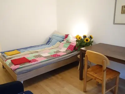 Ein Bett oder Betten in einem Zimmer der Unterkunft Private Rooms in Prenzlauerberg