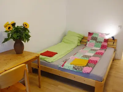 Ein Bett oder Betten in einem Zimmer der Unterkunft Private Rooms in Prenzlauerberg