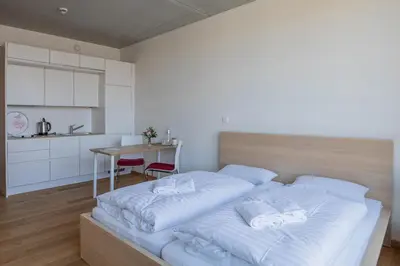Ein Bett oder Betten in einem Zimmer der Unterkunft SUKHAVATI Apartments