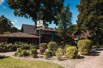 Ein Garten an der Unterkunft Pension Lehnigksberg