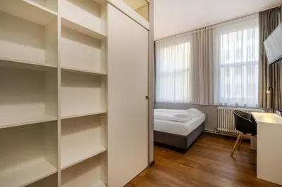 Ein Bett oder Betten in einem Zimmer der Unterkunft mk hotel berlin