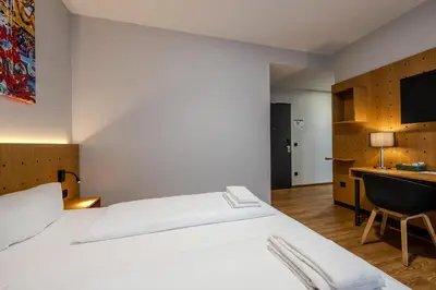 Ein Bett oder Betten in einem Zimmer der Unterkunft mk hotel berlin