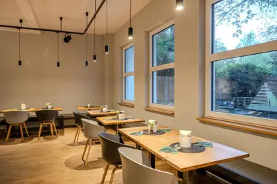 Ein Restaurant oder anderes Speiselokal in der Unterkunft mk hotel berlin