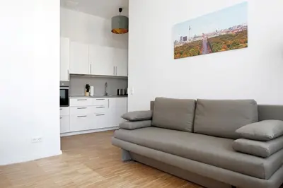 Küche/Küchenzeile in der Unterkunft SC 01 by ROCKCHAIR Apartments l SUPERHOST Status l 2 Bedrooms Boxspringbeds Balcony Elevator - Cozy Family & Business Flair welcomes you!